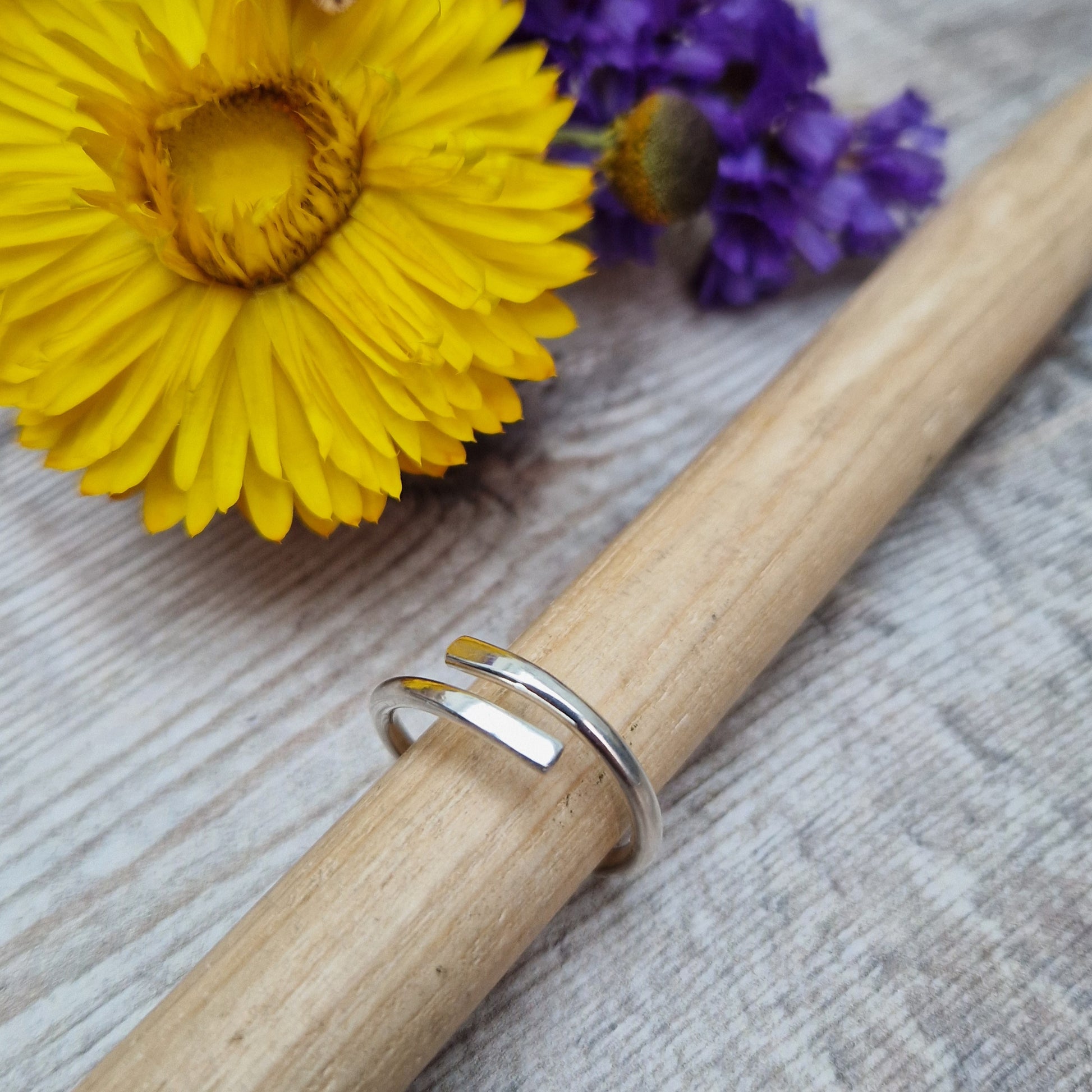 Sterling Silver ring that wraps around the finger and overlaps.