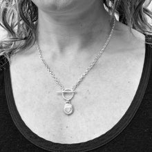 Load image into Gallery viewer, Sterling Silver Pebble Heart Necklace Shown Being Worn