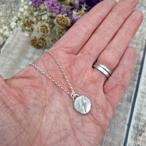 Sterling Silver Pebble Necklace with Lightning Flash