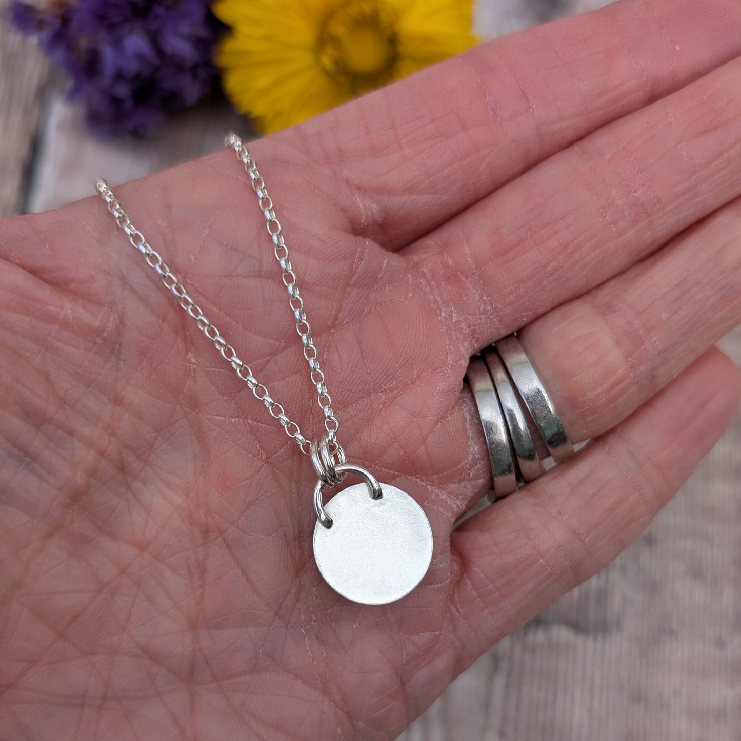 Back view of Silver Colourful Small Round Surfite Necklace showing smooth sterling silver finish