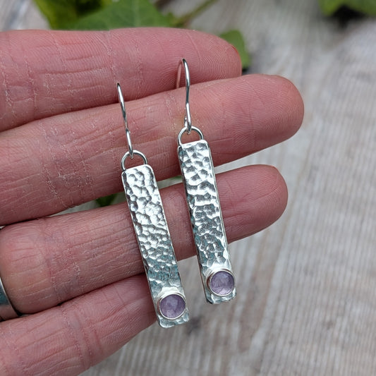 Silver Hammered Rectangle Earrings with Lavender Amethyst held in a hand showing hammered texture and stone detail