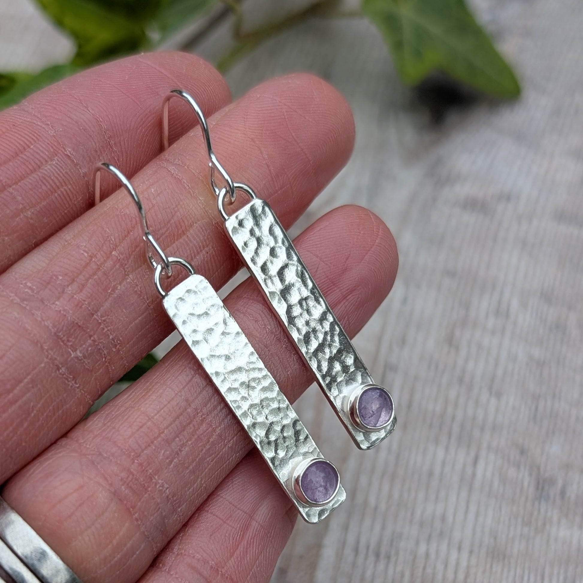 Close-up of Silver Hammered Rectangle Earrings with Lavender Amethyst showing hammered surface and soft purple stones