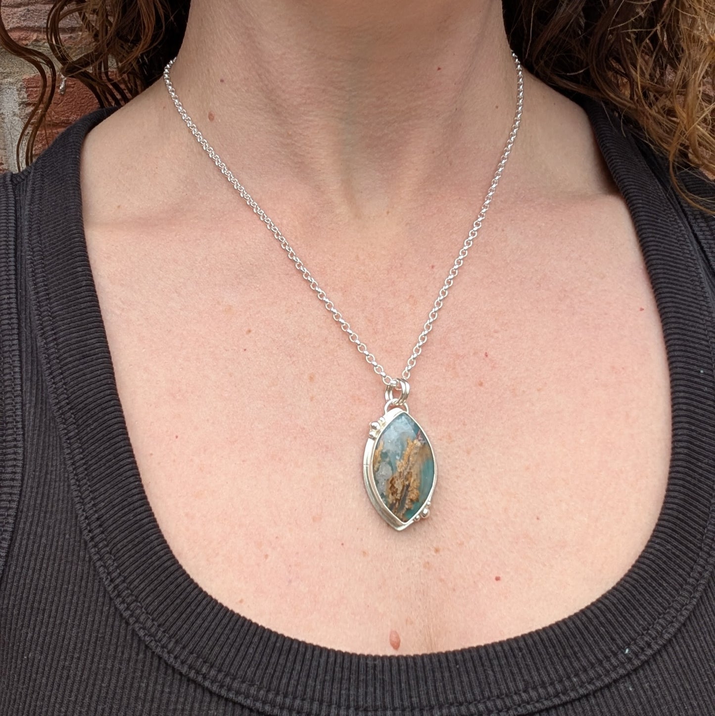 Silver Regency Rose Plume Agate Necklace worn on a silver chain, showing the size and shape of the handmade pendant.