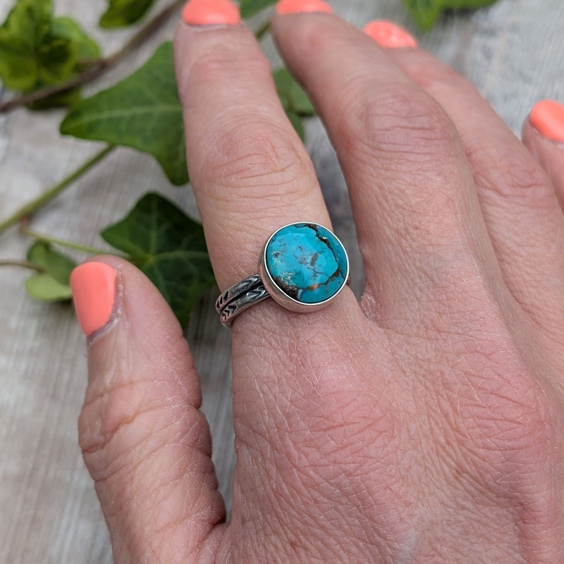 Silver Sunburst Stamped Ring with Turquoise worn on hand showing scale and fit