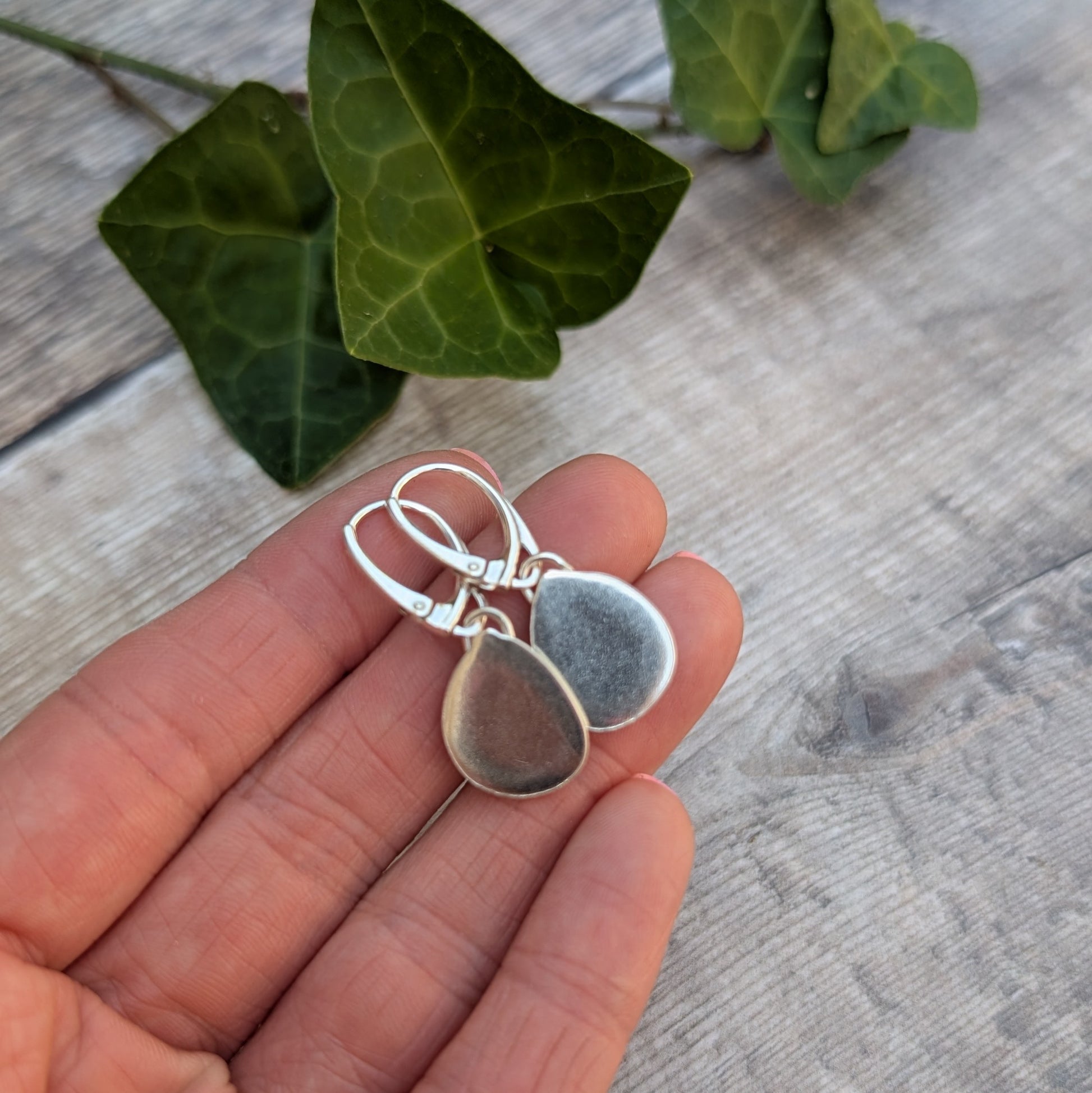 Back of the Turquoise Blue Aurora Opal Teardrop Earrings handmade from recycled Sterling Silver, showing the smooth polished silver finish.